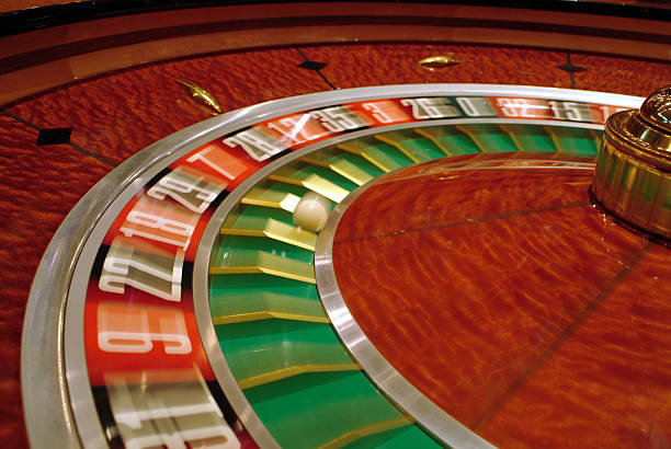 Diamond Empire slot game interface showing five reels with gem symbols and cascading win animation